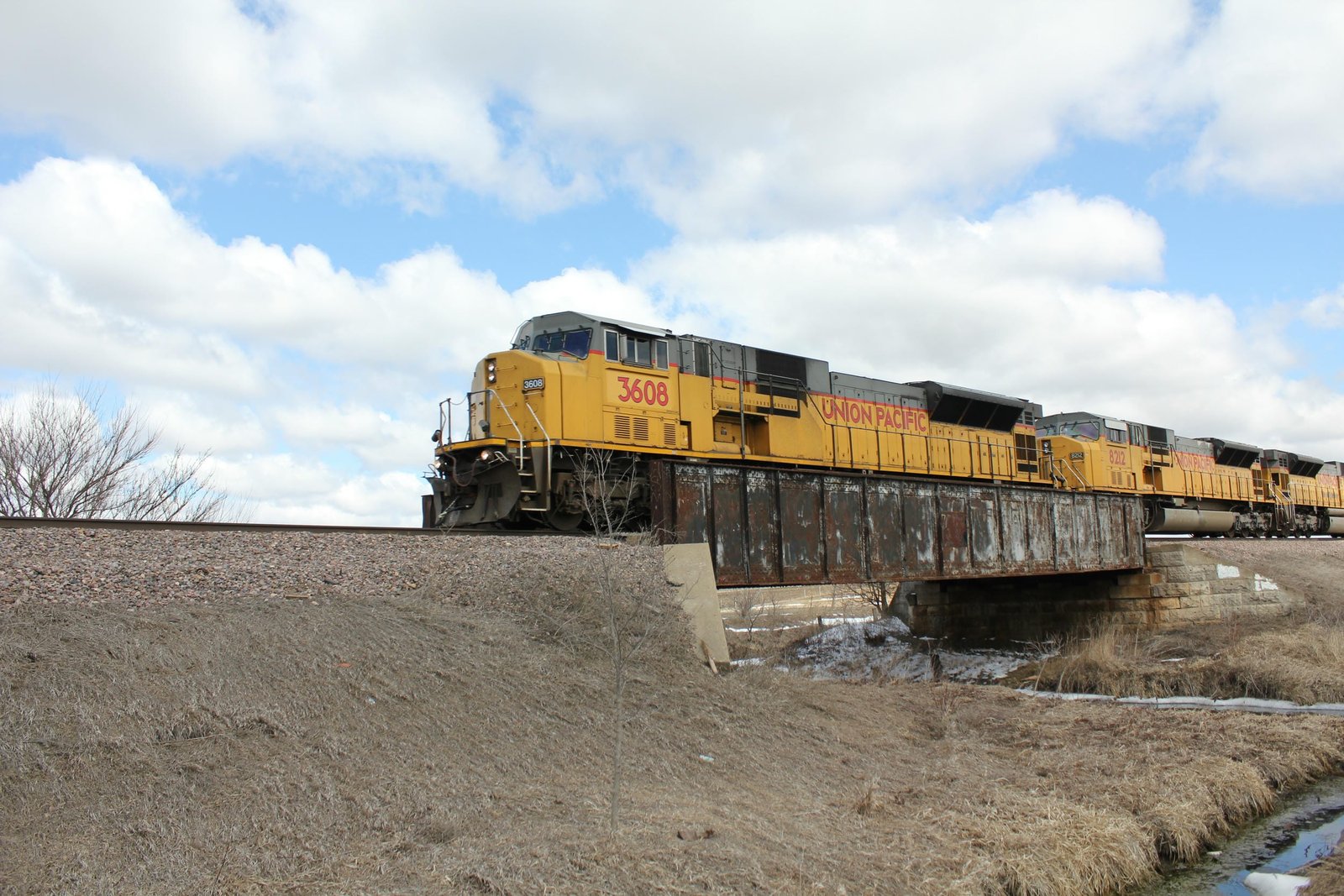Westbound train crossing bridge